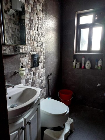Bathroom in 3 BHK Apartment at Royal Classic Co Op Society, Andheri West – for Sale