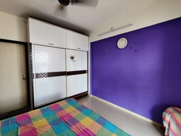Bedroom in 3 BHK Apartment at Nisarg Hyde Park, Kharghar – for Rent