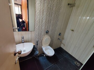 Bathroom in 3 BHK Apartment at Nisarg Hyde Park, Kharghar – for Rent