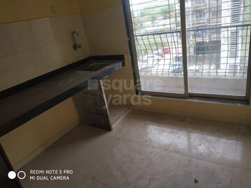 Kitchen in 1 BHK Apartment at Stratosphere Spring Wood, Taloja – for Sale