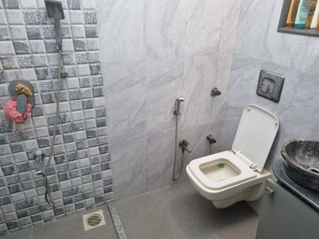 Bathroom in 2 BHK Apartment at Oshiwara Mhada, Andheri West – for Sale
