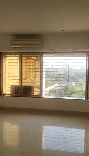 Bedroom in 3 BHK Apartment at Thakur Badrinath Tower, Andheri West – for Rent