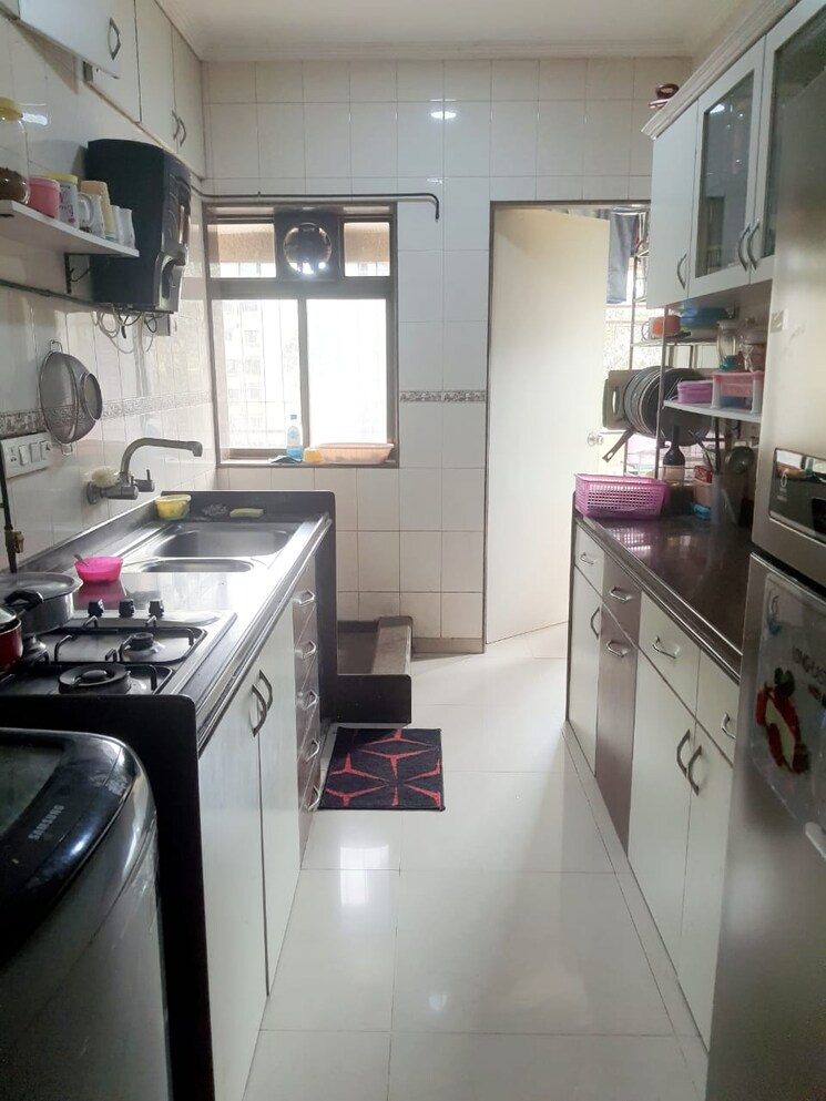 Kitchen, chanchal-kalyan-complex 2 Bedroom 825 Sq.Ft. Apartment In Yari Road Mumbai 4988086