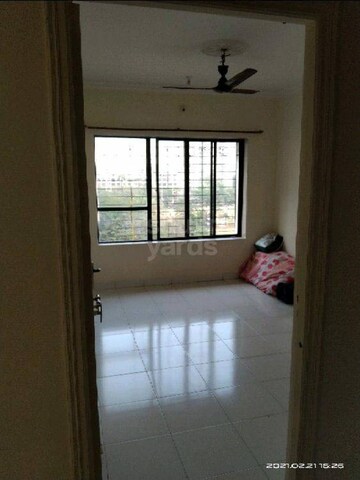 Room in 1.5 BHK Apartment at Swastik Pushkar Accord, Kandivali East – for Sale