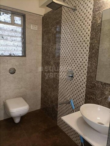 Bathroom in 2 BHK Apartment at Acme Oasis, Kandivali East – for Sale