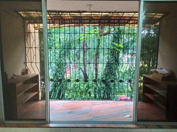 Living Room in 2 BHK Apartment at Acme Oasis, Kandivali East – for Sale