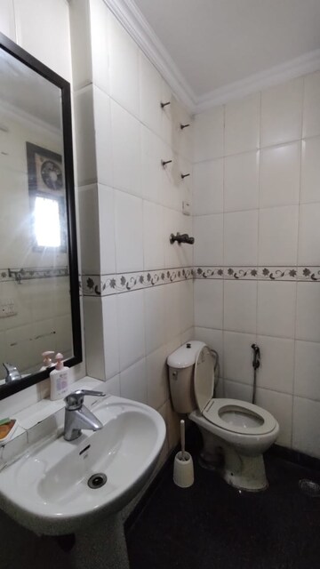 Bathroom in 3 BHK Apartment at Emaar Palm Gardens, Sector 83 – for Sale