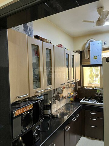 Kitchen in 1 BHK Apartment at Bhoomi Legend, Kandivali East – for Sale