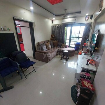 Living Room in 2 BHK Apartment at Prism Enclave, Kandivali East – for Sale