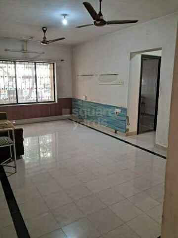Room in 2 BHK Apartment at Essbel CHS, Kandivali East – for Sale