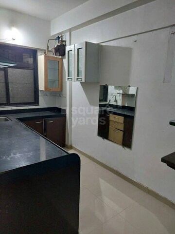 Kitchen in 2 BHK Apartment at Essbel CHS, Kandivali East – for Sale