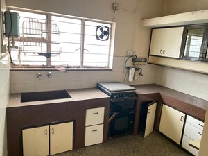 Kitchen in 3 BHK Apartment at Camp Universal Apartment, Camp – for Rent