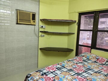 Bedroom in 1.5 BHK Apartment at Ravi Kiran CHS Vile Parle, Vile Parle West – for Sale