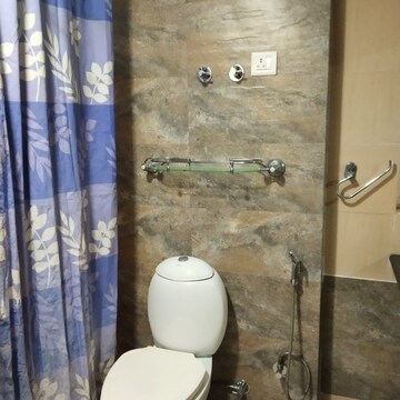 Bathroom in 3 BHK Apartment at Orchid Petals, Sector 49 – for Rent