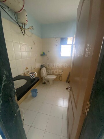Bathroom in 2 BHK Apartment at Manikchand Malabar, Lulla Nagar – for Sale