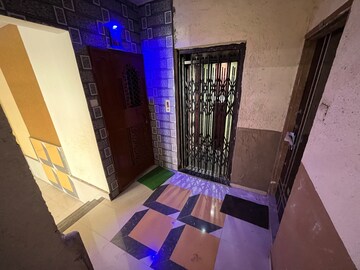 Living Room in 1 BHK Apartment at Amar Vinay Residency, Boisar – for Rent