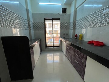 Kitchen in 1 BHK Apartment at Amar Vinay Residency, Boisar – for Rent