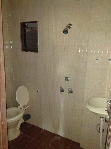 Bathroom in 1 BHK Apartment at Nanda Amrut Residency, Boisar – for Rent