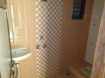 Bathroom in 1 BHK Apartment at Nanda Amrut Residency, Boisar – for Rent