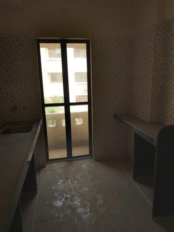 Kitchen in 1 BHK Apartment at Nanda Amrut Residency, Boisar – for Rent