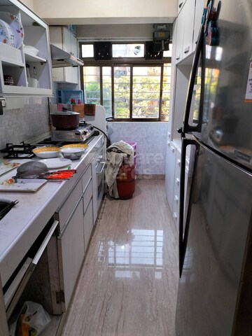 Kitchen in 3 BHK Apartment at Shiv Shivam Apartment, Andheri West – for Sale