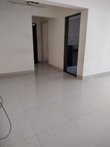 Living Room in 2 BHK Apartment at Palash Towers, Andheri West – for Rent