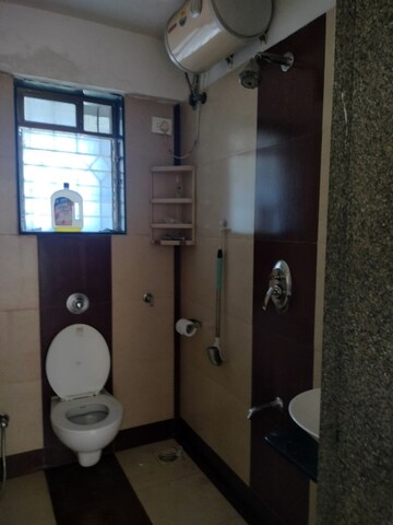 Bathroom in 2 BHK Apartment at Palash Towers, Andheri West – for Rent