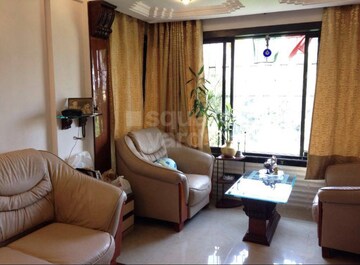 Living Room in 2 BHK Apartment at Hibiscus CHS Versova, Versova – for Rent