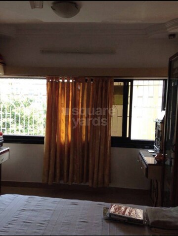 Master Bedroom in 2 BHK Apartment at Hibiscus CHS Versova, Versova – for Rent
