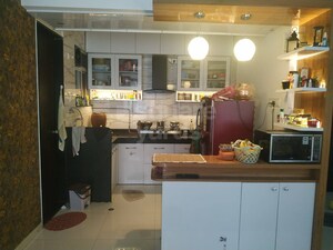 Kitchen in 2 BHK Apartment at Dynamic Grandeur, Undri – for Rent