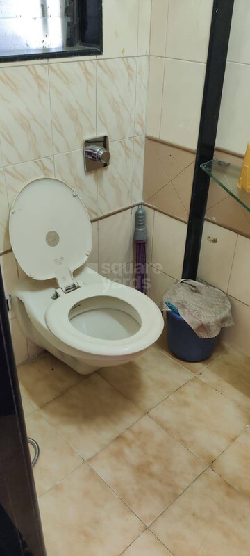 Bathroom in 2 BHK Apartment at Evershine Greens, Andheri West – for Rent