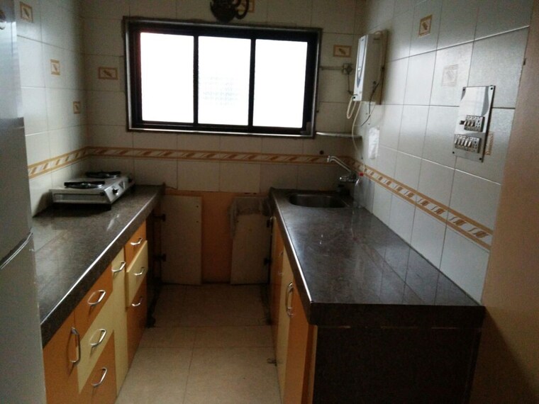 Kitchen, ujwal-park-apartments 2 Bedroom 1000 Sq.Ft. Apartment In Nibm Road Pune 5467357