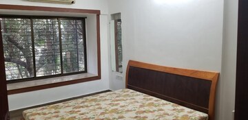 Bedroom in 2 BHK Apartment at Oshiwara Mhada, Andheri West – for Rent
