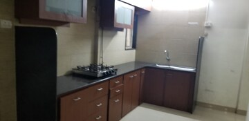 Kitchen in 2 BHK Apartment at Oshiwara Mhada, Andheri West – for Rent