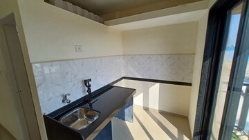Kitchen in 1 BHK Apartment at Conceptual Suraksha Smart City Phase I, Vasai East – for Sale
