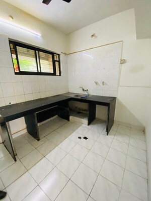 Kitchen in 2 BHK Apartment at Grafficon Apartment, Nibm Road – for Rent