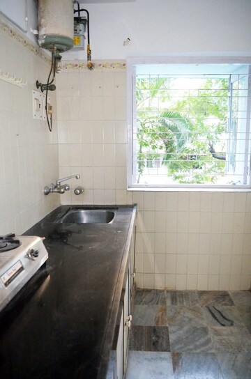 Bathroom in 1 BHK Apartment at Aashirwad Apartments, Andheri West – for Sale