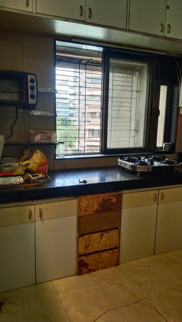 Kitchen in 2 BHK Apartment at Indradarshan II, Oshiwara – for Rent