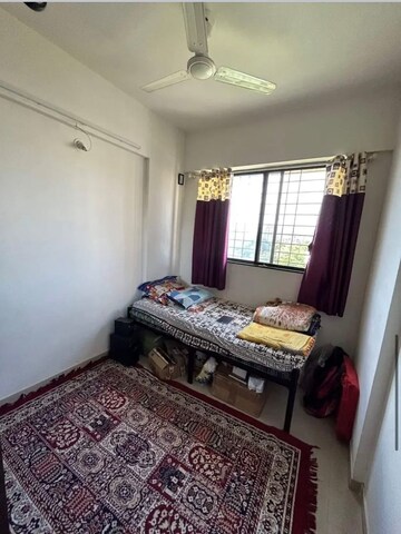 Bedroom in 2 BHK Apartment at Kolte Patil Margosa Heights, Mohammadwadi – for Sale