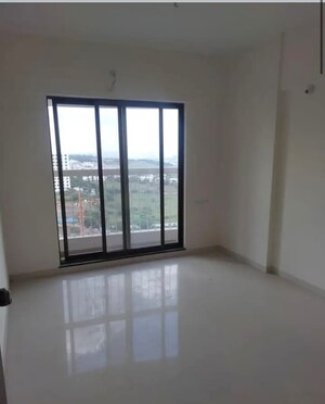 Bedroom in 2 BHK Apartment at Mohammadwadi – for Sale