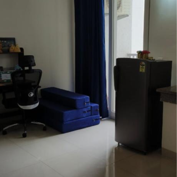Living Room in 2 BHK Apartment at Emaar The Palm Drive-Palm Studios, Sector 66 – for Rent