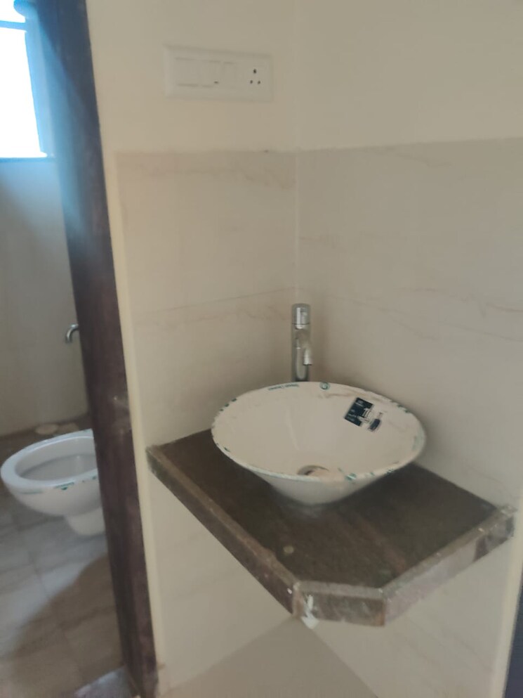 Bathroom, nirman-viva-phase-iii 2 Bedroom 803 Sq.Ft. Apartment In Ambegaon Budruk Pune 5589240