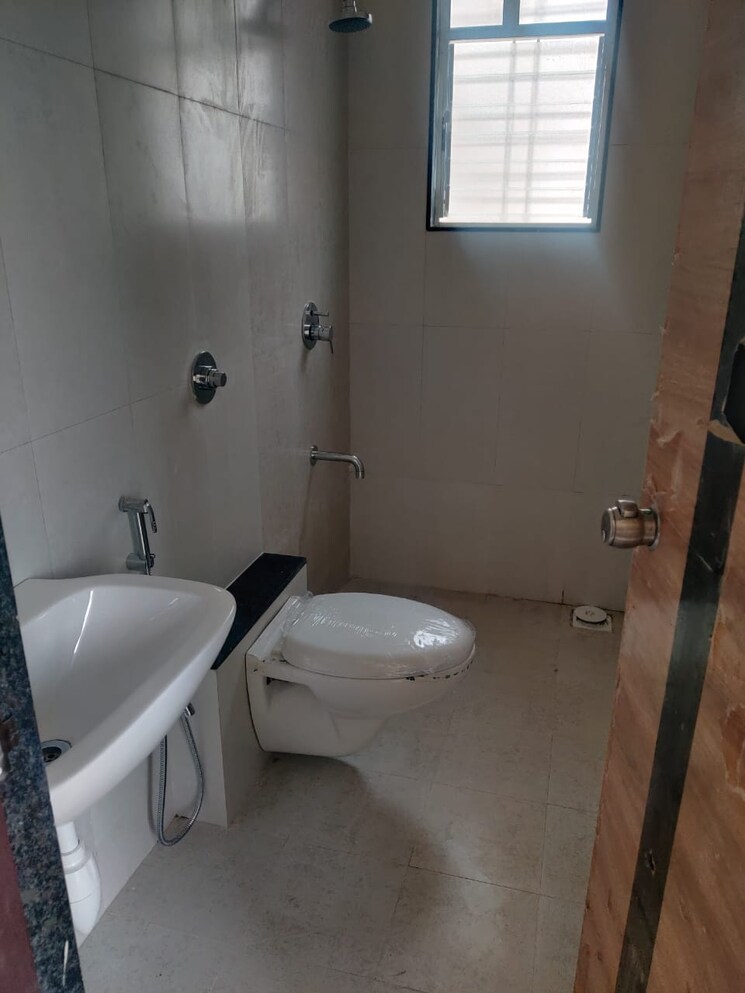 Bathroom, nirman-viva-phase-iii 1 Bedroom 650 Sq.Ft. Apartment In Ambegaon Budruk Pune 5591258