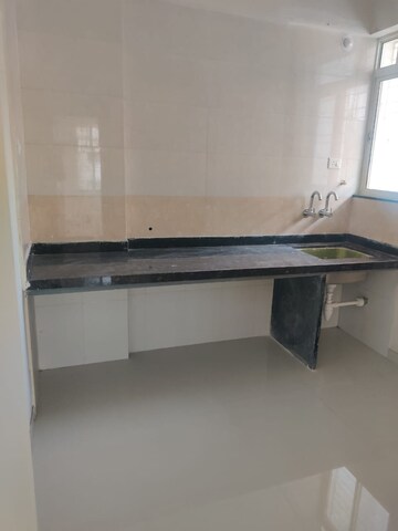 Kitchen in 1 BHK Apartment at Nirman Viva Phase III, Ambegaon Budruk – for Sale