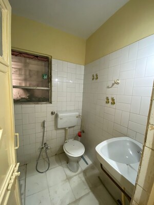 Bathroom in 3 BHK Apartment at Salunkhe Vihar Society – for Rent