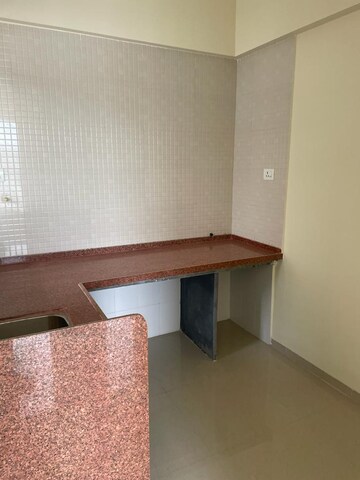 Kitchen in 1 BHK Apartment at Nirman Ajinkyatara, Sinhagad Road – for Sale