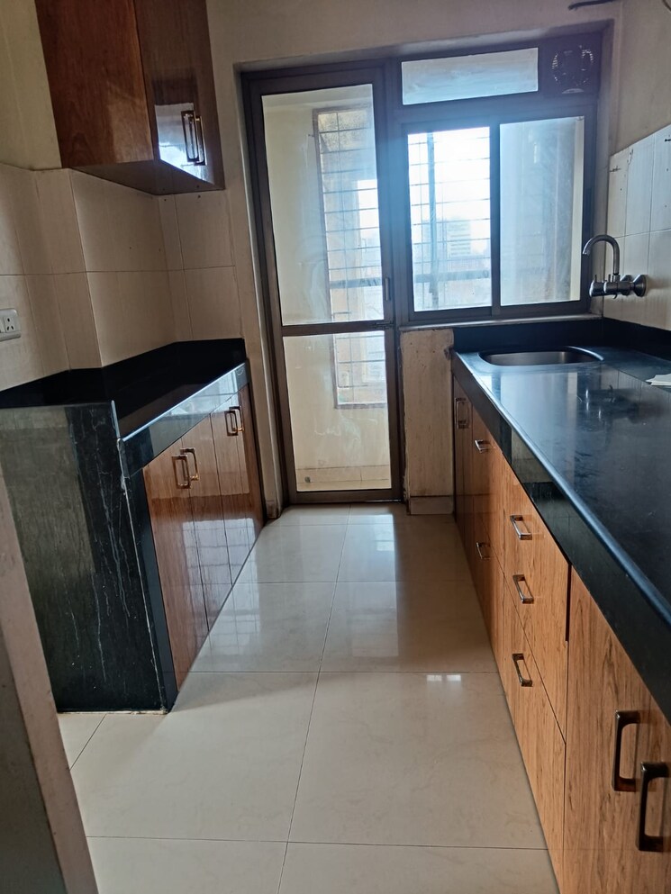 Kitchen, olive-apartment 2 Bedroom 815 Sq.Ft. Apartment In Nalasopara West Palghar 5630269
