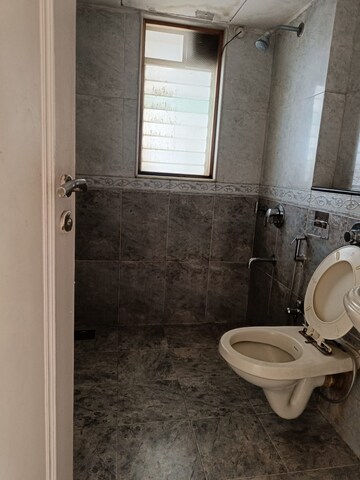 Bathroom in 2 BHK Apartment at Olive Apartment, Nalasopara West – for Rent