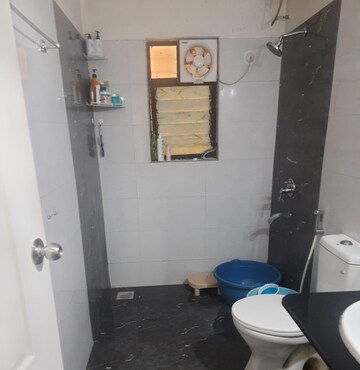 Bathroom in 2 BHK Apartment at Kolte Patil Margosa Heights, Mohammadwadi – for Sale