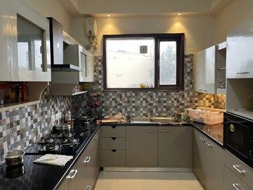 Kitchen in 4 BHK Apartment at DLF The Primus, Sector 82a – for Sale
